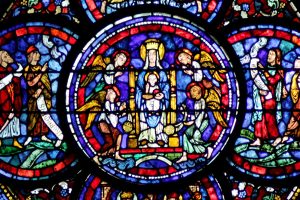 Partie haute du vitrail des Miracles de la Vierge de la cathédrale Notre-Dame de Chartres.