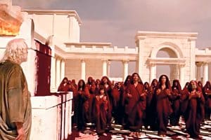 Saint Jean (Richard Harris) face aux élus lavant leur robe « par le sang de l’Agneau » (Ap 7, 14), dans L’Apocalypse, de Raffaele Mertes (2002).